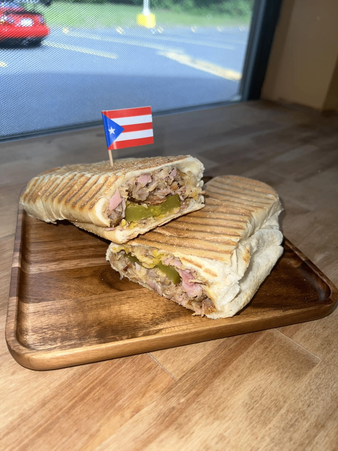Pressed Cuban-style sandwich with pork and pickles